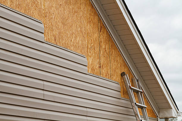 Professional Siding Replacement technician working in Berlin, NJ